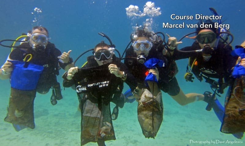 always hold a mesh bag in your hands while scuba diving